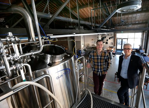 WAYNE GLOWACKI / WINNIPEG FREE PRESS

Real Estate.  At left,  Little Brown Jug founder Kevin Selch and his landlord Brian Scharfstein, president, Canadian Footwear Ltd. inside the new micro-brewery which opened recently in the West Exchange District.  Murray McNeill story   Dec.15 2016