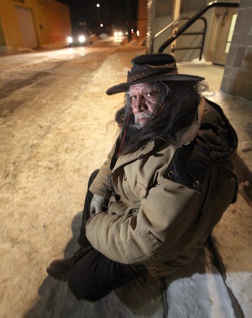 PHIL HOSSACK / WINNIPEG FREE PRESS -  Gordon sits on an ice packed inner city sidewalk Thursday. See Jenn Zorati's story re: Homeless......   - December 15, 2016