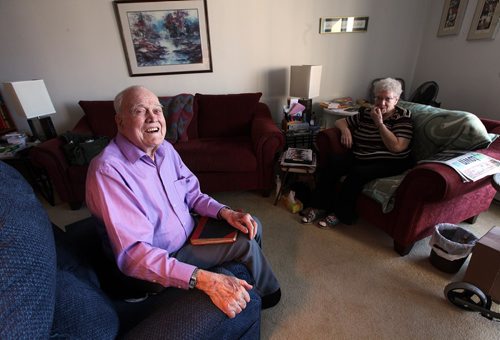 PHIL HOSSACK / WINNIPEG FREE PRESS - Ian and Carely Thomson share a lighter moment in their Henderson Hwy Apartment. He flew Halifax Bombers in WW2. See Kevin Rollason's story. December 15, 2016