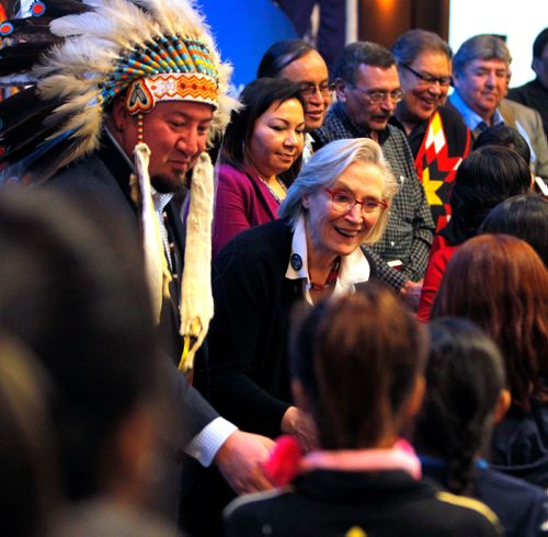 BORIS MINKEVICH / WINNIPEG FREE PRESS
Manitoba First Nations School System Education Governance Agreement Signing Ceremony at the Victoria Inn & Conference Centre, 1808 Wellington Avenue. L-R Assembly of Manitoba Chiefs Grand Chief Derek Nepinak, Manitoba Keewatinowi Okimakanak Inc. Grand Chief Sheila North Wilson (in red jacket), Southern Chief's Organization Inc. Grand Chief Terrance Nelson (just behind North Wilson), and The Honourable Carolyn Bennett, Minister of Indigenous and Northern Affairs (bending over glasses white hair) shake hands with a line up of kids at the end of the ceremony. BILL REDEKOP STORY. Dec. 16, 2016