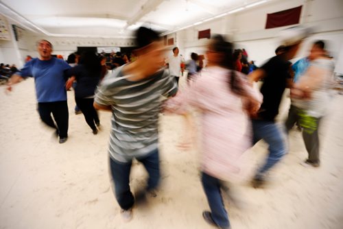 JOHN WOODS / WINNIPEG FREE PRESS
Residents swing their partners during a community dance in Baker Lake September 22, 2016
