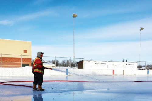 Canstar Community News Brad Padoba flooding the Northern Rink at Park City West Community Centre on Dec. 13. (supplied)