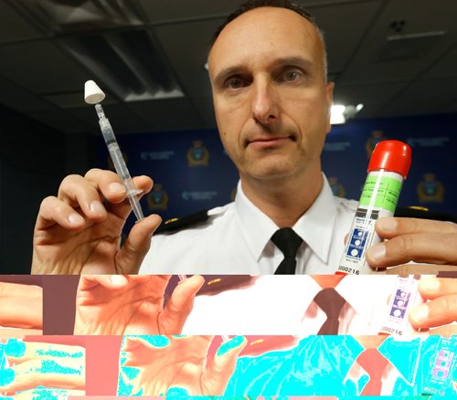 WAYNE GLOWACKI / WINNIPEG FREE PRESS

Winnipeg Police Inspector Max Waddell with a opioid overdose response Naloxone Nasal Spray kit, a medication used to reverse the effects of opioids and prevent potentially fatal overdoses.  He was at Justice Minister Heather Stefansons announcement the Manitoba government will provide nearly $30,000 to purchase naloxone kits like this one shown for police officers in Winnipeg and other municipal and First Nation police services across the province.  The event took place Monday at the Poliice HQ.See  Govt news release. Dec.19 2016