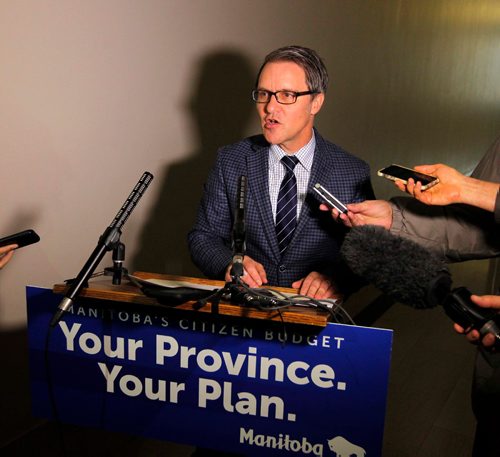 BORIS MINKEVICH / WINNIPEG FREE PRESS
Finance Minister Cameron Friesen talks about the deficit forecast outside his office at the Manitoba Legislative Building to the media during a press conference. NICK MARTIN STORY. Dec. 20, 2016