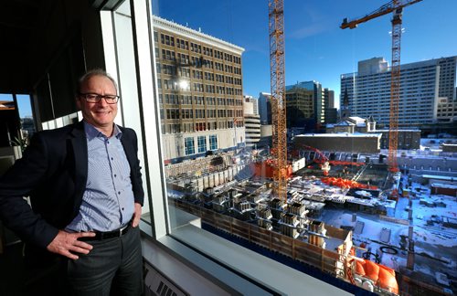 WAYNE GLOWACKI / WINNIPEG FREE PRESS

Jim Ludlow, president and CEO of True North Real Estate Development with the True North Square construction site outside the window.  Murray McNeill story. Dec.20 2016