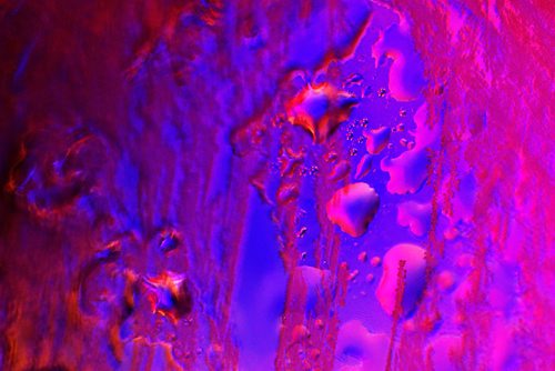 JOHN WOODS / WINNIPEG FREE PRESS
Abstract image of Christmas lights at 503 Kildare seen through water/ice on glass Tuesday, December 20, 2016.