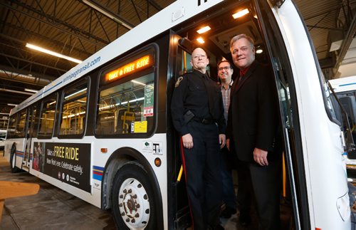 WAYNE GLOWACKI / WINNIPEG FREE PRESS

From right, Ward Keith, with Manitoba Public Insurance, City Councillor Marty Morantz and Staff Sgt. Rob Riffel, with the Winnipeg Police Service at the announcement Wednesday the Winnipeg Transit service will partner with MPI to offer free Transit service on New Years Eve. The free ride program apples to all regular and Handi-Transit service starting at 7:00P.M. to the end of the service. The last buses leave downtown at 1:35A.M. The news conference Wednesday took place in the Brandon Avenue Transit Garage.  See city release.  Dec.21 2016