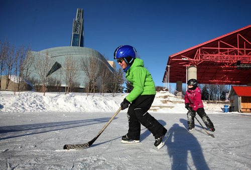 RUTH BONNEVILLE / WINNIPEG FREE PRESS


Will Lougheed (9yrs, green jacket), his sister Anna in pink  (7yrs) and their mom Sharon Scott from Calgary enjoy a pickup game of hockey on the rink at the Forks Wednesday afternoon while visiting family here in Winnipeg for the holidays.  

Standup photo 



 Dec 21, 2016