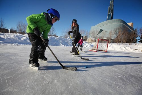RUTH BONNEVILLE / WINNIPEG FREE PRESS


Will Lougheed (9yrs), his sister Anna (7yrs) and their mom Sharon Scott from Calgary enjoy a pickup game of hockey on the rink at the Forks Wednesday afternoon while visiting family here in Winnipeg for the holidays.  

Standup photo 



 Dec 21, 2016