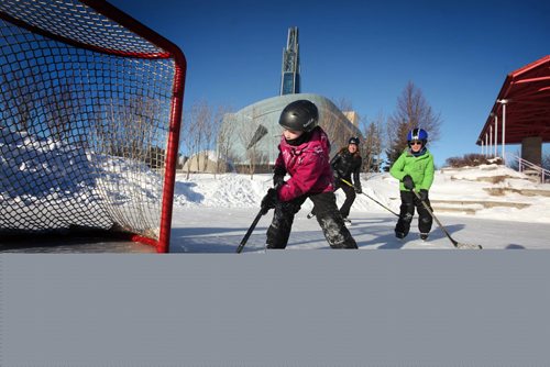 RUTH BONNEVILLE / WINNIPEG FREE PRESS


Anna Lougheed (7yrs) prepares to score in the open net while playing hockey with her brother Will Lougheed (9yrs), and their mom Sharon Scott all from Calgary on the rink at the Forks Wednesday afternoon while visiting family here in Winnipeg for the holidays.  

Standup photo 



 Dec 21, 2016