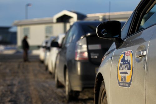 RUTH BONNEVILLE / WINNIPEG FREE PRESS

Unicity Taxis line up at the Winnipeg Airport Corral waiting their turn in line to park at airport for passengers Wednesday.  Story about Uber ride service coming to Winnipeg.   
See Bill Redekop story.  

 Dec 21, 2016