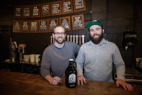 MIKE DEAL / WINNIPEG FREE PRESS
Tyler Birch (right), owner of Barn Hammer Brewing Co. and Brian Westcott, head brewer at Barn Hammer on Wall Street. Tyler says that his company will survive without the fund to support the local craft beer business that the Manitoba Liqour and Lotteries corp canceled today.
161221 - Wednesday, December 21, 2016.