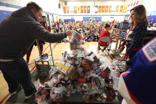 TREVOR HAGAN / WINNIPEG FREE PRESS
Students and staff at Bonnycastle School managed to bring in over 2400lbs of food to donate to Winnipeg Harvest, outweighing the combined total of Chris Walby, Bob Toogood, Chris Thorburn and Jermese Jones, Thursday December 22, 2016.