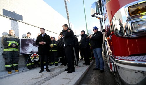 TREVOR HAGAN / WINNIPEG FREE PRESS
Mayor Brian Bowman, Hydro CEO Kelvin Shepherd, and members of the Winnipeg Fire Department paid tribute to fireman who died 90 years ago today during a fire at Adelaide and Notre Dame, Friday, December 23, 2016.