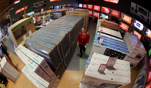 TREVOR HAGAN / WINNIPEG FREE PRESS
Visions staff prepare inventory for Boxing Day, Friday, December 23, 2016. for boxing day special