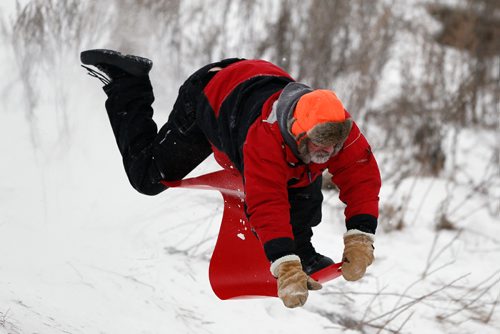 JOHN WOODS / WINNIPEG FREE PRESS
 Dwayne Taphorn catches some air as he slides down Garbage Hill Sunday, December 25, 2016.

