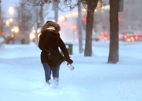 WAYNE GLOWACKI / WINNIPEG FREE PRESS

A pedestrian trudges along Portage Ave. Monday morning facing the Boxing Day winter storm. Dec.26 2016