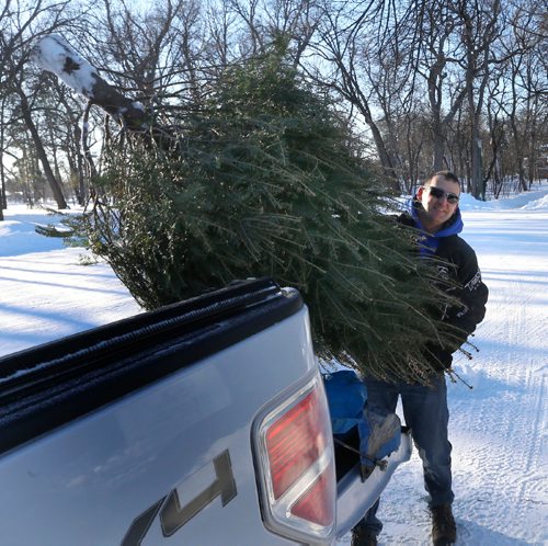 WAYNE GLOWACKI / WINNIPEG FREE PRESS 

Tim Furlong drops off the family Christmas tree at the Let's Chip In Depot in Kildonan Park Tuesday morning. Let's Chip In Depots through out the city are now open until January 20.  All plastic tree bags, tinsel, lights, decorations and tree stands must be removed before leaving a tree at a depot. Trees placed next to recycling or garbage carts will not be collected. see city news release.   Dec.27 2016