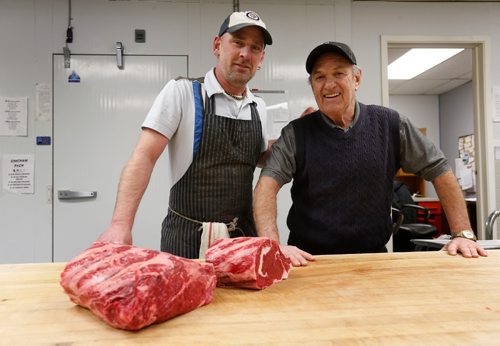 WAYNE GLOWACKI / WINNIPEG FREE PRESS 

Butchers Dennis Dueck, at right, and his son Mark at their family-owned shop, Dennys Meat Market on Wilton St. Jill Wilson story.  Dec.27 2016