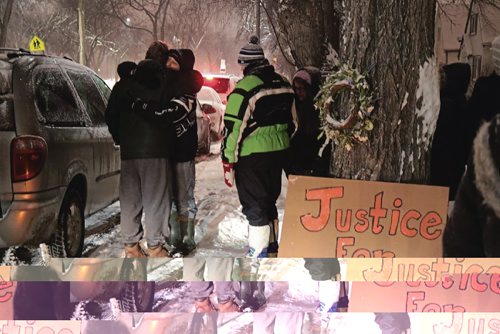 Canstar Community News Kevin Joss is hugged by friends and family at the Vigil for Cody on Dec. 19, 2016.