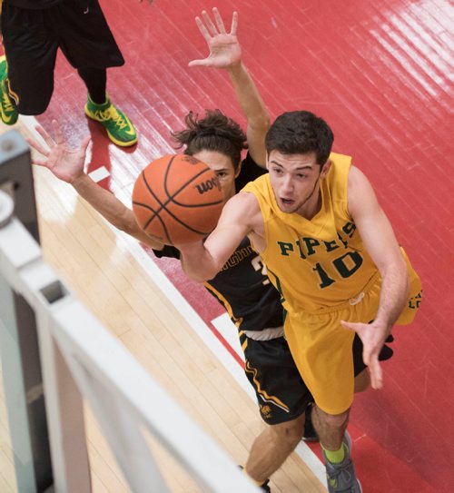 DAVID LIPNOWSKI / WINNIPEG FREE PRESS 

John Taylor Collegiate pipers Ricky Zimbakov (#10) during game against the Fort Richmond Centurions as part of the annual Wesmen Classic Tuesday December 25, 2016 at the Duckworth Centre.