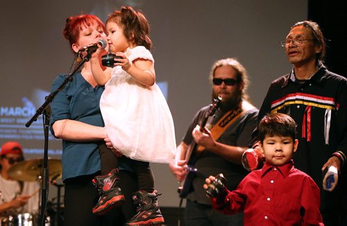 JASON HALSTEAD / WINNIPEG FREE PRESS

Bradley Ross, 3, and her brother Ryan Ross, 5, join J.D. and the Sunshine Band musicians, from left, Ana Scott, Tom Fodey and Kirby Boucher at the West End Cultural Centres annual holiday dinner and concert on Dec. 22, 2016. (See Social Page)