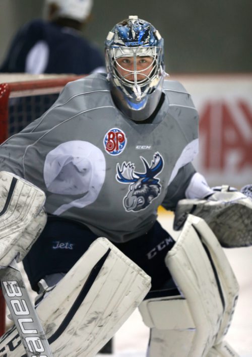 WAYNE GLOWACKI / WINNIPEG FREE PRESS 

Goaltender Eric Comrie  at the Manitoba Moose practice Thursday in the MTS IcePlex. Mike McIntyre story.  Dec.29 2016