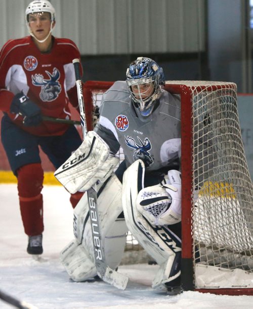 WAYNE GLOWACKI / WINNIPEG FREE PRESS 

Goaltender Eric Comrie at the Manitoba Moose practice Thursday in the MTS IcePlex. Mike McIntyre story.  Dec.29 2016