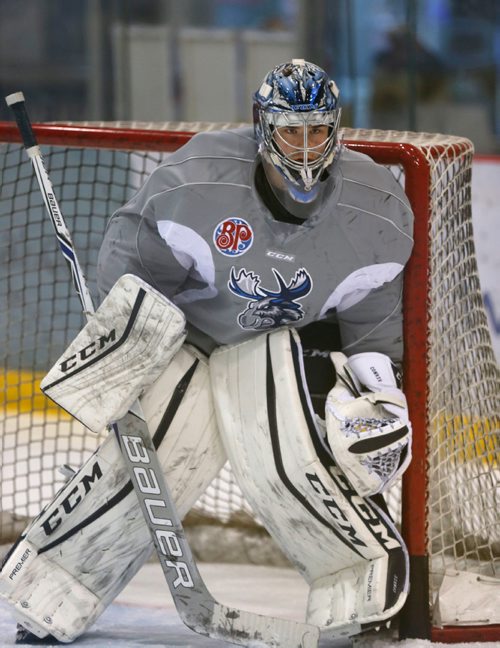 WAYNE GLOWACKI / WINNIPEG FREE PRESS 

Goaltender Eric Comrie at the Manitoba Moose practice Thursday in the MTS IcePlex. Mike McIntyre story.  Dec.29 2016