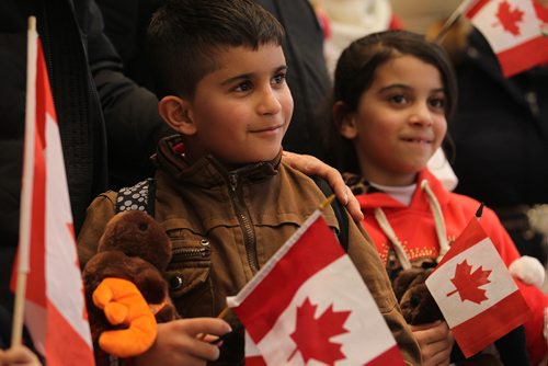 
RUTH BONNEVILLE / WINNIPEG FREE PRESS


The Al Ali Syrian families twins. eight-year-old twins, Mohammad and Zainab  are all smiles  at James Richardson International Airport with their parents Khaled, his wife Muntaha and their little sister Naya (20mnths) to a crowd of friends, family and supporters Thursday afternoon. 
See Carol Sanders story.  
 Dec 29, 2016