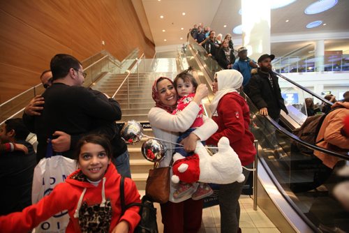 
RUTH BONNEVILLE / WINNIPEG FREE PRESS


Winnipegger Zainab Ali hugs her niece Naya Al Ali (20mnths) at James Richardson International Airport Thursday afternoon.  Her brother and his wife - the Al Ali family of five consisting of husband Khaled, wife Muntaha El Barakat, 8-year-old twins Zainab and Mohammad and 20-month-old daughter Naya arrived in Winnipeg at James Richardson International Airport Thursday afternoon.

  See Carol Sanders story.  
 Dec 29, 2016