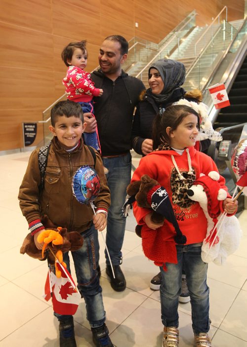 
RUTH BONNEVILLE / WINNIPEG FREE PRESS


Pix of the arrival of the Al Ali family of five consisting of husband Khaled, wife Muntaha El Barakat, 8-year-old twins Zainab and Mohammad and 20-month-old daughter Naya arrive in Winnipeg at James Richardson International Airport Thursday afternoon. 
See Carol Sanders story.  
 Dec 29, 2016