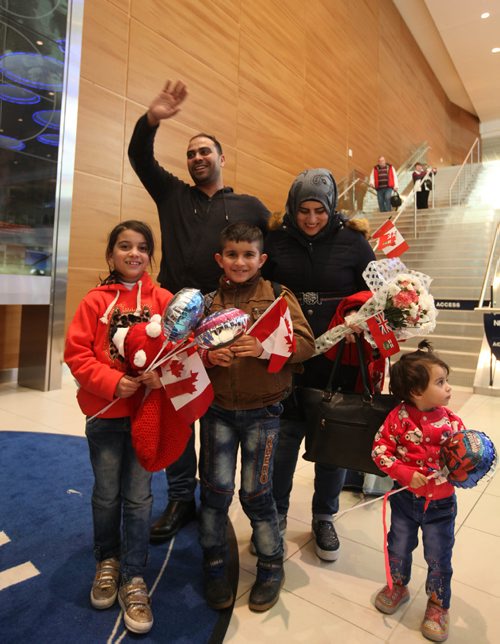 
RUTH BONNEVILLE / WINNIPEG FREE PRESS


Pix of the arrival of the Al Ali family of five consisting of husband Khaled, wife Muntaha El Barakat, 8-year-old twins Zainab and Mohammad and 20-month-old daughter Naya arrive in Winnipeg at James Richardson International Airport Thursday afternoon. 
See Carol Sanders story.  
 Dec 29, 2016