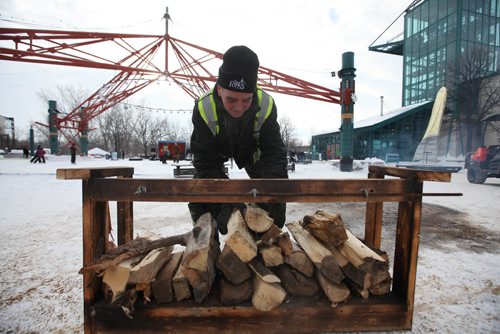 RUTH BONNEVILLE / WINNIPEG FREE PRESS

Forks maintenance site staff prep the grounds with fire pits and fire wood during the day Saturday in anticipation of the crowds of people coming out to celebrate New Years Eve later Saturday night. 
Standup photo 
 Dec 31, 2016