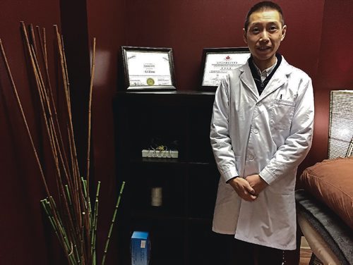 Canstar Community News Dec. 19, 2016 - Dr. Li Zhou practices acupuncture, Gua Sha, and cupping at the clinic at 115B Regent Avenue West. (SHELDON BIRNIE/CANSTAR/THE HERALD)