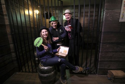 RUTH BONNEVILLE / WINNIPEG FREE PRESS

Laura Hawkins with her husband Allan and daughter Shea Kosokowsky pose for a photo in one of their escape rooms. Laura and her business partner/daughter Shea,  have a family owned booming business called Enigma Escapes.
See Martin Cash story.  

Jan 04, 2017
