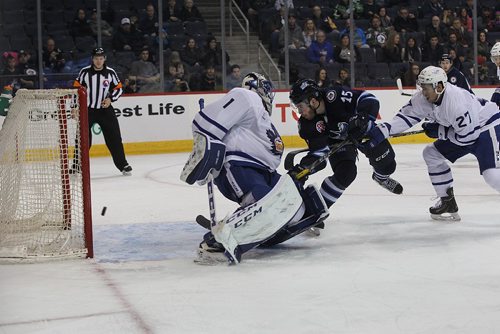 RUTH BONNEVILLE / WINNIPEG FREE PRESS

Manitoba Moose #15 SCOTT GLENNIE  snaps the puck into the net after it rebounded off the back boards past Toronto Marlies  Goalie #1 Jhonas Enroth during a power play in 2nd  period action at MTS Centre Wednesday night.  Score with this goal  now 2 - 1 for the Moose.  

Jan 04, 2017