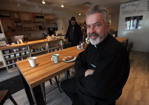 PHIL HOSSACK / WINNIPEG FREE PRESS - .Rev Donald McKenzie poses at a neighborhood bustro near St Philips Church in St Boniface Friday morning. See Intersection piece by Dave Sanderson. ...January 6, 2017