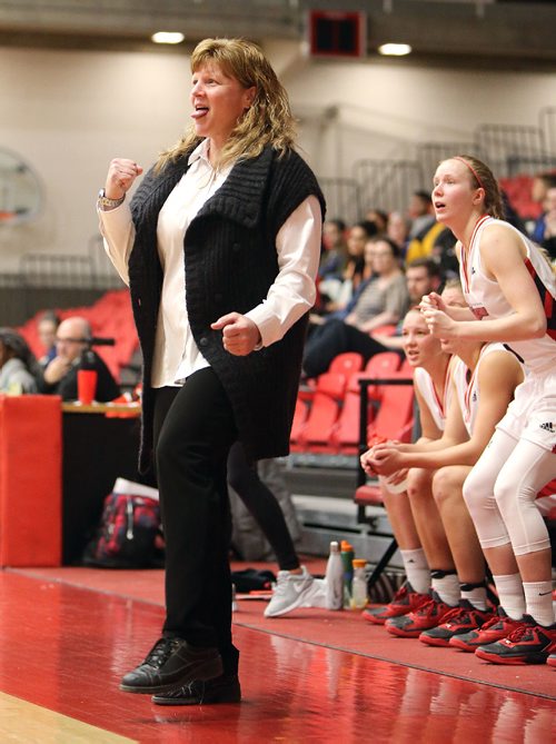 JASON HALSTEAD / WINNIPEG FREE PRESS

University of Winnipeg Wesmen head coach Tanya McKay cheers as her team scores against the Trinity Western Spartans during Canada West basketball action at the University of Winnipeg on Jan. 6, 2017.