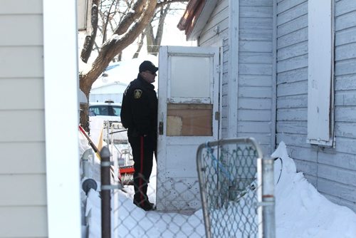 RUTH BONNEVILLE / WINNIPEG FREE PRESS

Police investigate home at  840 College Ave. after surrounding it early Saturday morning and taking individuals into custody on what is believed to be drug related charges.  A passerby said he heard shots fired prior  to seeing people taken into custody.  Officer on scene said no one was injured in incident.  
Standup photo 
 Jan 07, 2017