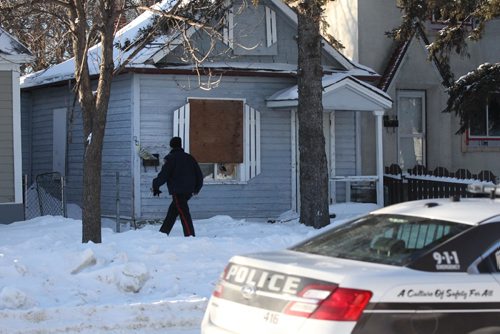 RUTH BONNEVILLE / WINNIPEG FREE PRESS

Police investigate home at  840 College Ave. after surrounding it early Saturday morning and taking individuals into custody on what is believed to be drug related charges.  A passerby said he heard shots fired prior  to seeing people taken into custody.  Officer on scene said no one was injured in incident.  
Standup photo 
 Jan 07, 2017