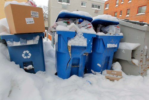 BORIS MINKEVICH / WINNIPEG FREE PRESS
Damaged recycling bins in the back lane behind 53 Furby Street. Jan. 10, 2017