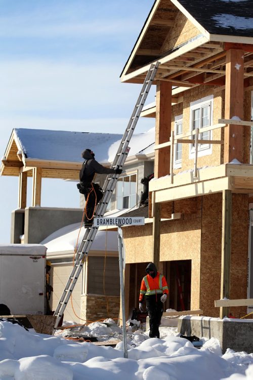 RUTH BONNEVILLE / WINNIPEG FREE PRESS

Biz: Crews work on framing a new home in Bridgwater Trails Tuesday.  See story on high volume of new home sales.  

 Jan 10, 2017