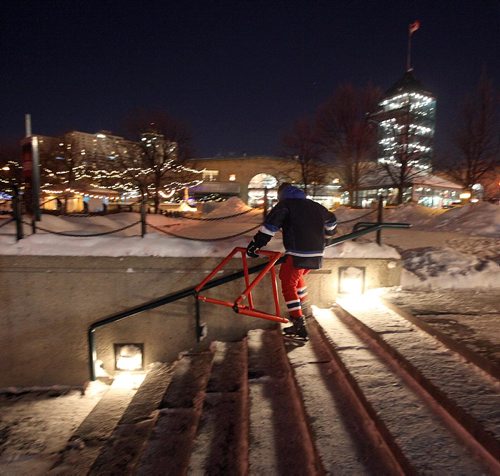 PHIL HOSSACK / WINNIPEG FREE PRESS -  RIVER TRAIL at NIGHT.....Dressed in "Habs" red socks, a skater side steps down from the Forks towards the Assinaboine River Tuesday night, carrying a support frame for a beginner.. Frigid temps were no barrier. Skaters cyclists and walkers started making their appearance Monday night when the Forks River trail opened officially for the season. ....January 10, 2017