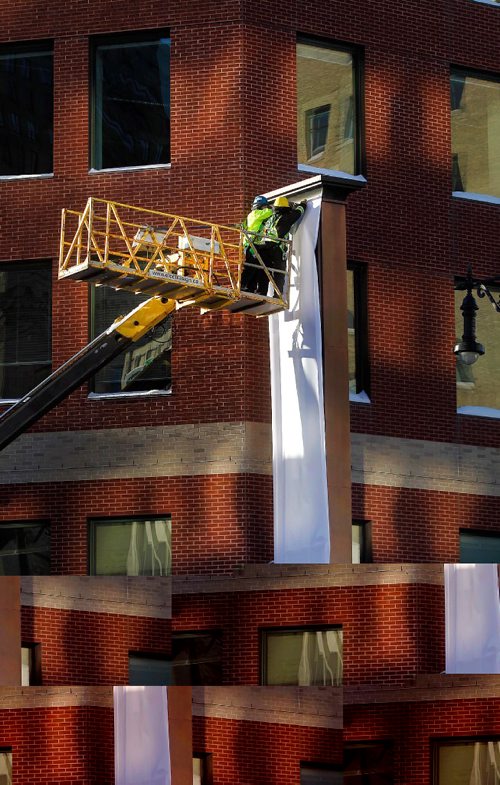 PHIL HOSSACK / WINNIPEG FREE PRESS -  The former Crocus building got a new name Wednesday afternoon as workers unveiled the new sign and McKim name. See release. STAND-UP 1 of 2 photos....January 11, 2017