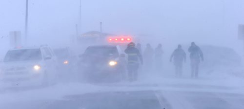 WAYNE GLOWACKI / WINNIPEG FREE PRESS
Fire Fighters at the scene of a  12-car pileup McPhillips and the
Perimeter in white out conditions.
Weather standup 
Jan 12 / 2017