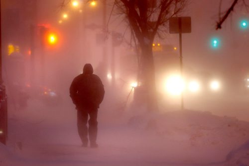 WAYNE GLOWACKI / WINNIPEG FREE PRESS 

A pedestrian faces the¤strong winds and extreme cold along Main St.¤Thursday morning.¤ Jan.12  2017