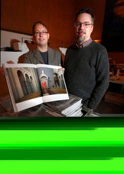 WAYNE GLOWACKI / WINNIPEG FREE PRESS 

Faith.  U of M professors Adam Muller,right, and Stephan Jaeger with their virtual synagogue exhibit catalogue, the exhibit will be shown at the Mennonite Heritage Centre Gallery on the CMU campus.  Brenda Suderman story Jan.13  2017