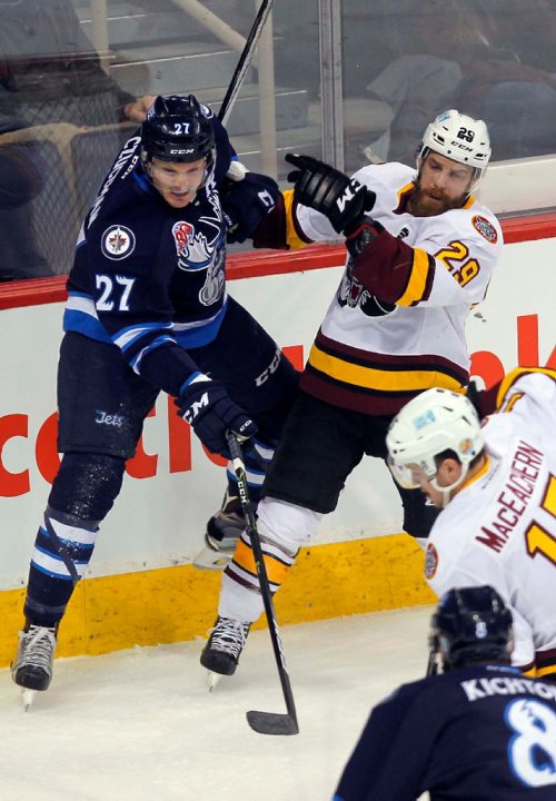 BORIS MINKEVICH / WINNIPEG FREE PRESS
Manitoba Moose vs Chicago Wolves @ MTS Centre. First Period. Moose #27 Kevin Czuczman, left,  and Wolves #29 Brett Sterling, left, battle it out behind the moose net. Wolves #15 Mackenzie MacEachern, middle, and Moose #8 Brenden Kichton, bottom. JAN. 13, 2017