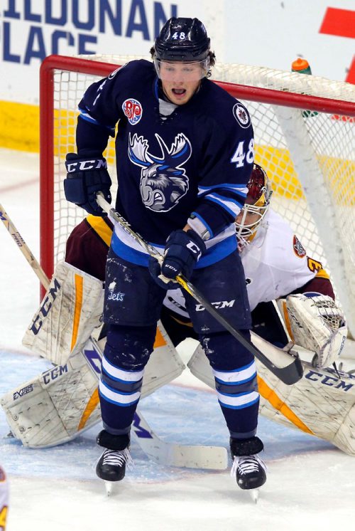 BORIS MINKEVICH / WINNIPEG FREE PRESS
Manitoba Moose vs Chicago Wolves @ MTS Centre. First Period. Moose #48 Brendan Lemieux tries to screen Wolves goalie #31 Pheonix Copley JAN. 13, 2017